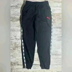 Puma black & white means track pants size Medium‎